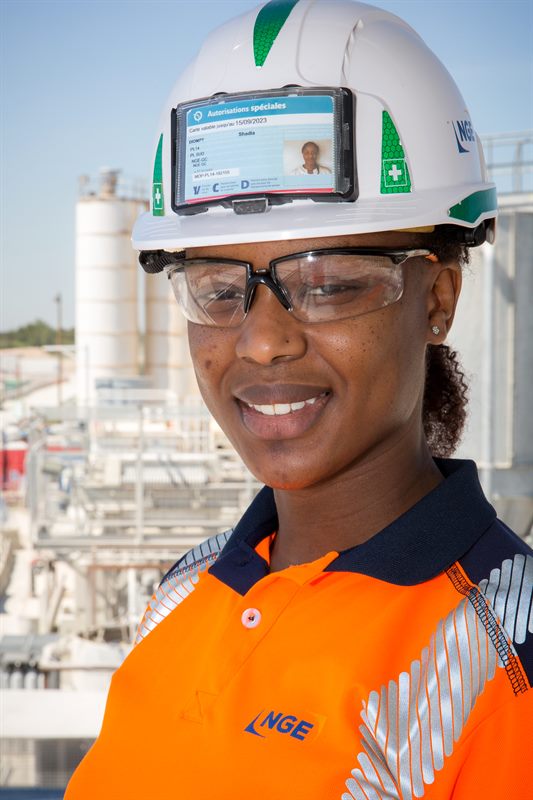 On site, with personal protective equipment in place.